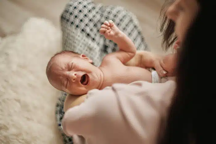 Understanding why babies cry after feeding — eight common reasons and what to check